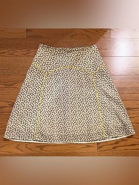 Cream and Black Patterned A-Line Skirt with Yellow Piping
